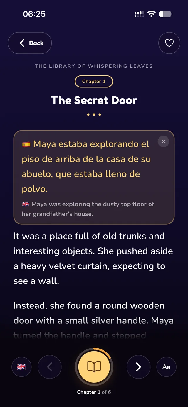 A WanderKid book in English with one sentence held open in Spanish, the English beneath it